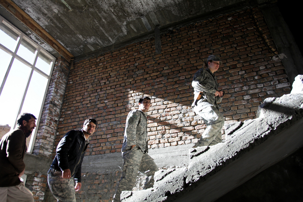 Afghan Interpreters U.S. service members and interpreters with the Panjshir Provincial Reconstruction Team visit the construction site of a girl's school in Froj village in the Anaba district of Afghanistan's Panjshir province in Jan. 2010.