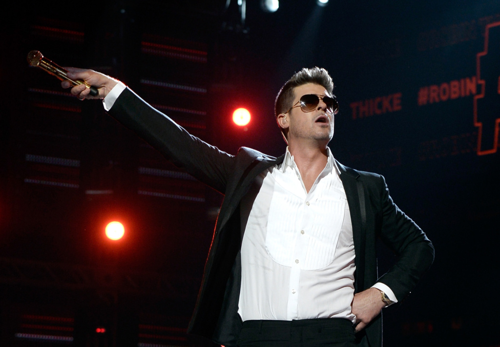 2013 BET Awards - Show LOS ANGELES, CA - JUNE 30: Singer Robin Thicke performs onstage during the 2013 BET Awards at Nokia Theatre L.A. Live on June 30, 2013 in Los Angeles, California. (Photo by Kevin Winter/Getty Images for BET)