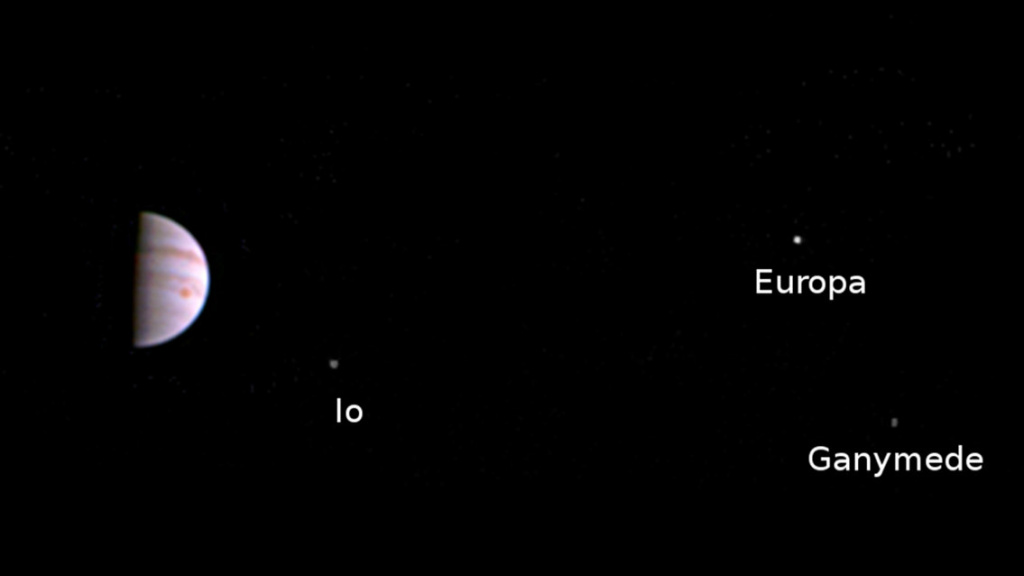 juno Juno's camera is sending photos like this one of Jupiter and three of its moons back to earth.
