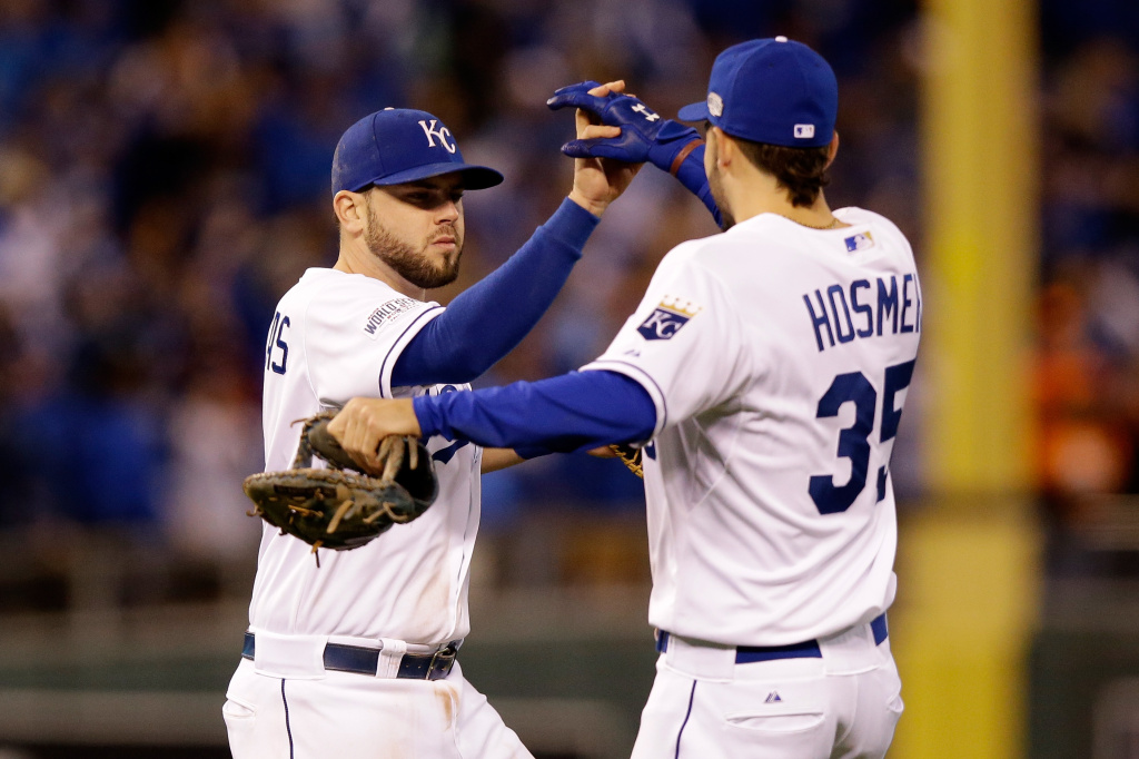 World Series - San Francisco Giants v Kansas City Royals - Game Six KANSAS CITY, MO - OCTOBER 28: Mike Moustakas #8 and Eric Hosmer #35 of the Kansas City Royals celebrate after defeating the San Francisco Giants by a score of 10-0 to win Game Six of the 2014 World Series at Kauffman Stadium on October 28, 2014 in Kansas City, Missouri. (Photo by Ezra Shaw/Getty Images)