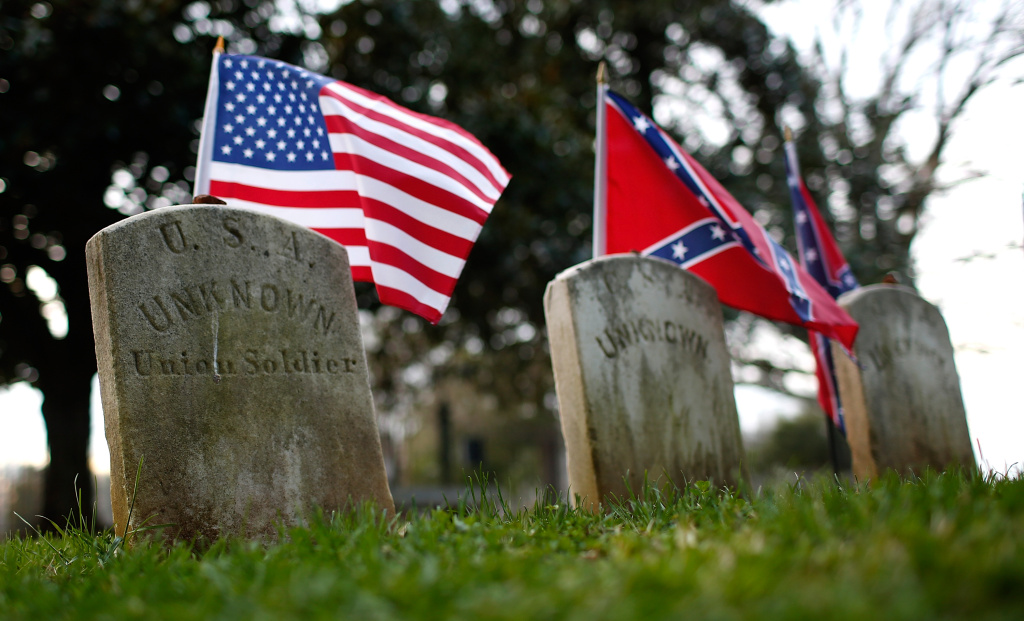 Appomattox Marks 150th Anniversary Of Surrender Of Lee's Army In Civil War The graves of a Union soldier with Confederate soldiers are shown at sunset at the Appomattox Court House National Historical Park April 7, 2015 in Appomattox, Virginia. Today is the 150th anniversary of Confederate General Robert E. Lee's surrender of the Army of Northern Virginia to Union forces commanded by General Ulysses S. Grant in the McLean House at Appomattox, Virginia. The surrender marked the beginning of the end of the American Civil War in 1865. (Photo by Win McNamee/Getty Images)