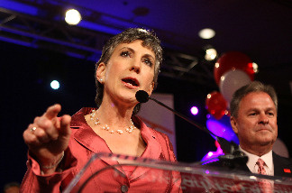 US Senate candidate and former Hewlett-Packard CEO Carly Fiorina celebrates her primary win with her husband Frank Fiorina at her side at the California Republican Party event on California Primary Election night on June 8, 2010 in Anaheim, California.