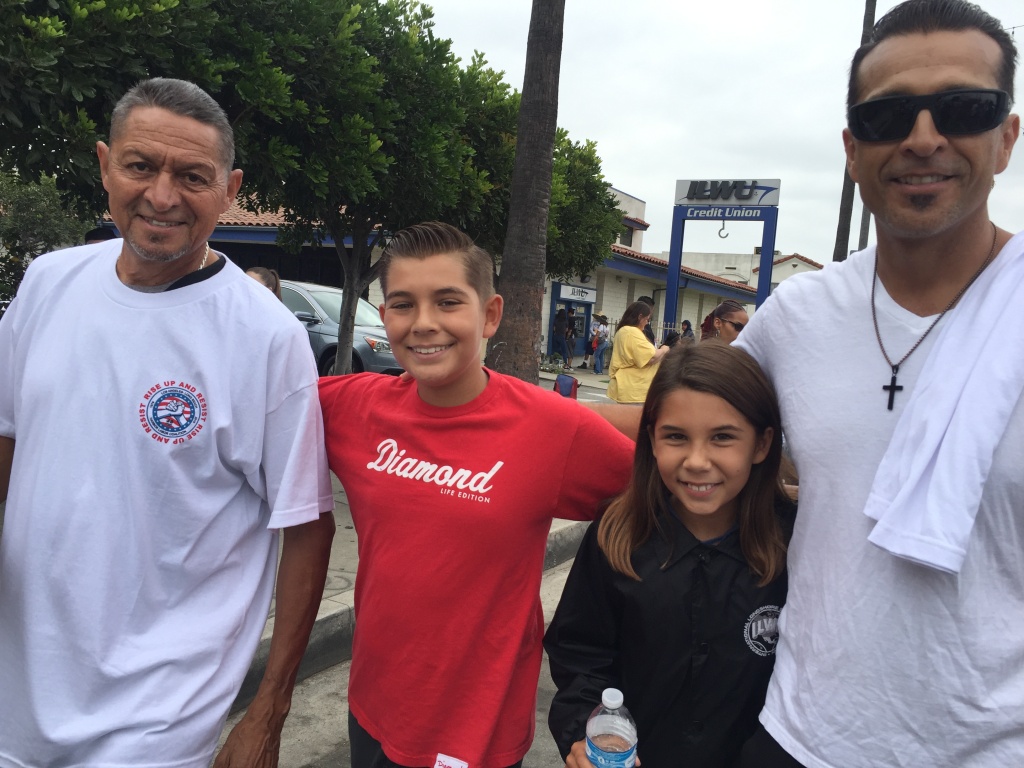 Labor day family Longshoreman Bobby Carrillo with his son and grandchildren at the Labor Day parade in Wilmington.