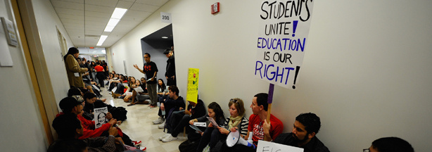 Students and faculty members stage a sit-in in front of the school president's office at California State University, Northridge demonstrating against proposed budget cuts at all 23 Cal State University campuses statewide on April 13, 2011.