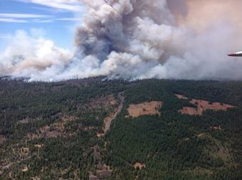 The Eiler Fire had burned 23,000 acres Sunday, with no containment, forcing evacuation for nearby communities.