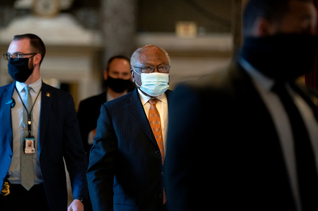 Rep. James Clyburn (D-SC) (C) wears a protective mask while walking to the House Floor at the U.S. Capitol on January 13, 2021 in Washington, DC. Rep. James Clyburn (D-SC) (C) wears a protective mask while walking to the House Floor at the U.S. Capitol on January 13, 2021 in Washington, DC.