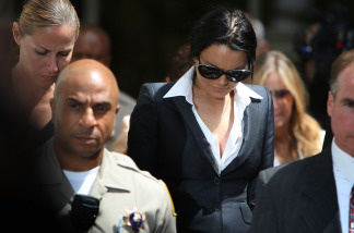 Actress Lindsay Lohan leaves the Beverly Hills Courthouse where she appeared for a probation status hearing on May 24, 2010 in Beverly Hills, California. A judge ordered Lohan to wear an alcohol-monitoring ankle bracelet. (Photo by David McNew/Getty Images)