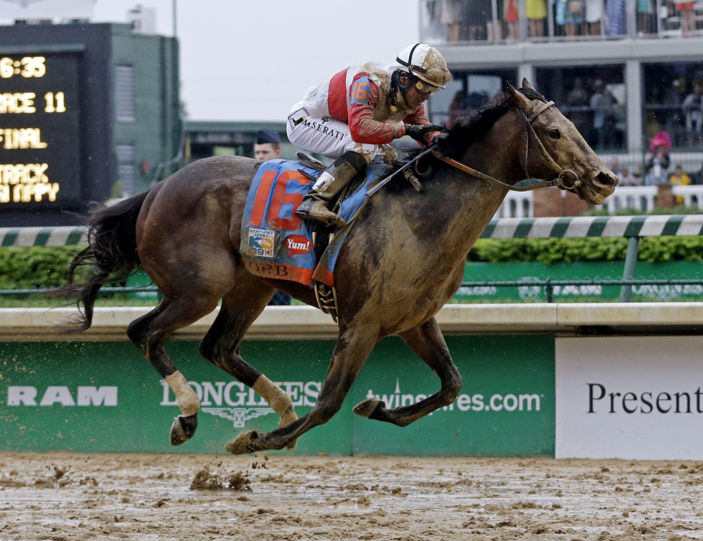 Joel Rosario rides Orb during the 139th Kentucky Derby at Churchill Downs Saturday, May 4, 2013, in Louisville, Ky.