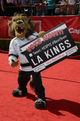 The 2012 ESPY Awards - Red Carpet LOS ANGELES, CA - JULY 11: Sportscaster Chris Berman (R) and Bailey the Los Angeles Kings Mascot arrive at the 2012 ESPY Awards at Nokia Theatre L.A. Live on July 11, 2012 in Los Angeles, California. (Photo by Jason Merritt/Getty Images)