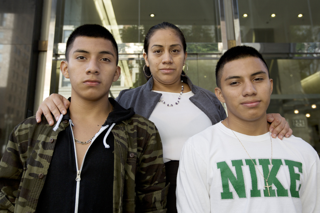 Salvadorian asylum seekers - inline Ana Hernández with her sons Luis González, 16 and Alejandro González, 16 (white shirt) stand on the steps of L.A.’s immigration court in downtown just ahead of a court date for their younger sister Mariela Michell on Friday, August 12th, 2016.