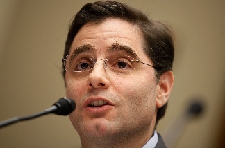 Federal Communications Commission Chairman Julius Genachowski testifies before the House Energy and Commerce Committee's Communications, Technology, and the Internet Subcommittee hearing March 25, 2010 in Washington, DC.