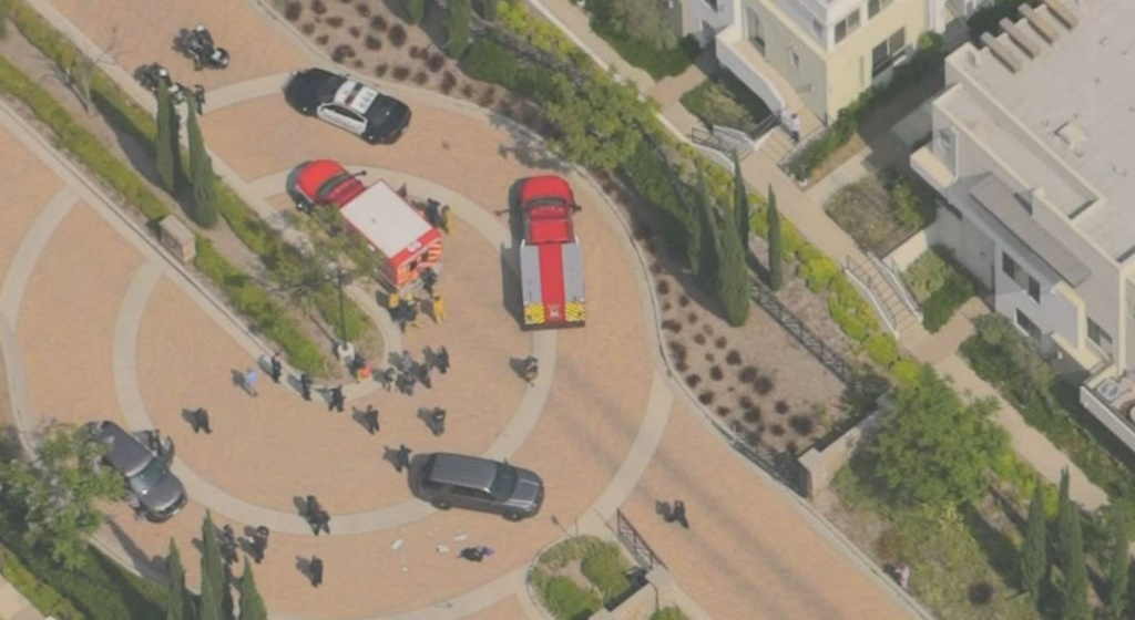 Los Angeles officer recovering after being shot in homicide suspect pursuit