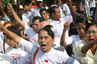Supporters of Aung San Suu Kyi gather in Yangon, Myanmar, in anticipation of her release Saturday.