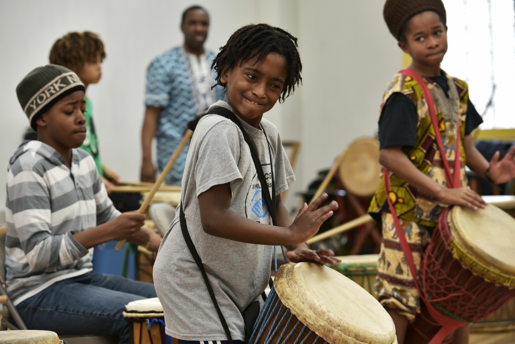 US-POLITICS-EDUCATION-HOME-SCHOOLING Ayinde, 10, who is homeschooled by his mother Monica Utsey, takes part in an African drumming class as an extracurricular activity in Mount Rainier, Maryland on February 24, 2017.