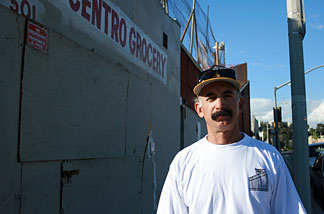 Truck driver George Del Rio stands in front of the El Centro grocery store. Del Rio, who grew up in the area, said he heard stories of the Nishiyamas, longtime operators of the store and the adjacent handball court, lending people money to pay rent or buy medicine for their sick children.