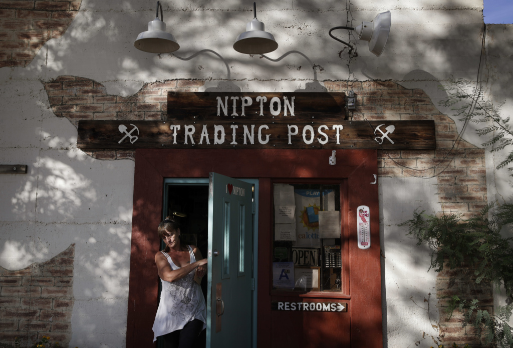 Marijuana Town A woman leaves the Nipton Trading Post, Thursday, Aug. 3, 2017, in Nipton, Calif. American Green Inc., one of the nation's largest cannabis companies, announced it has bought the entire 80 acre California desert town of Nipton.