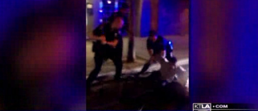 KTLA 5 aired footage of Long Beach police officers subduing a man they say was resisting arrest early Sunday morning.