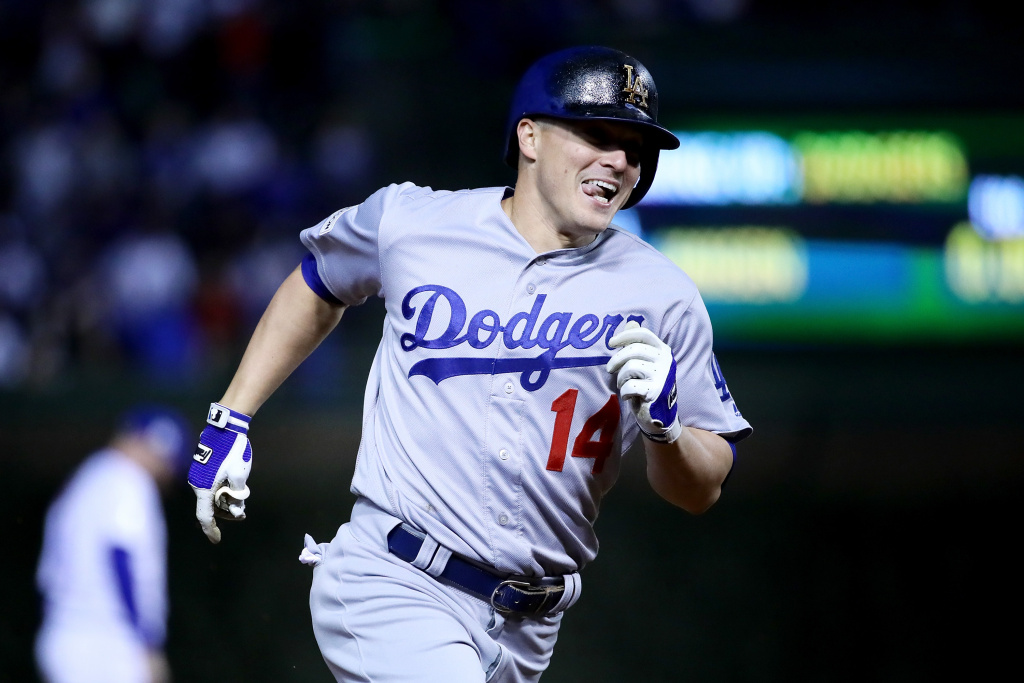 League Championship Series - Los Angeles Dodgers v Chicago Cubs - Game Five Enrique Hernandez #14 of the Los Angeles Dodgers rounds the bases after hitting a home run in the ninth inning against the Chicago Cubs during game five of the National League Championship Series at Wrigley Field on October 19, 2017 in Chicago, Illinois.