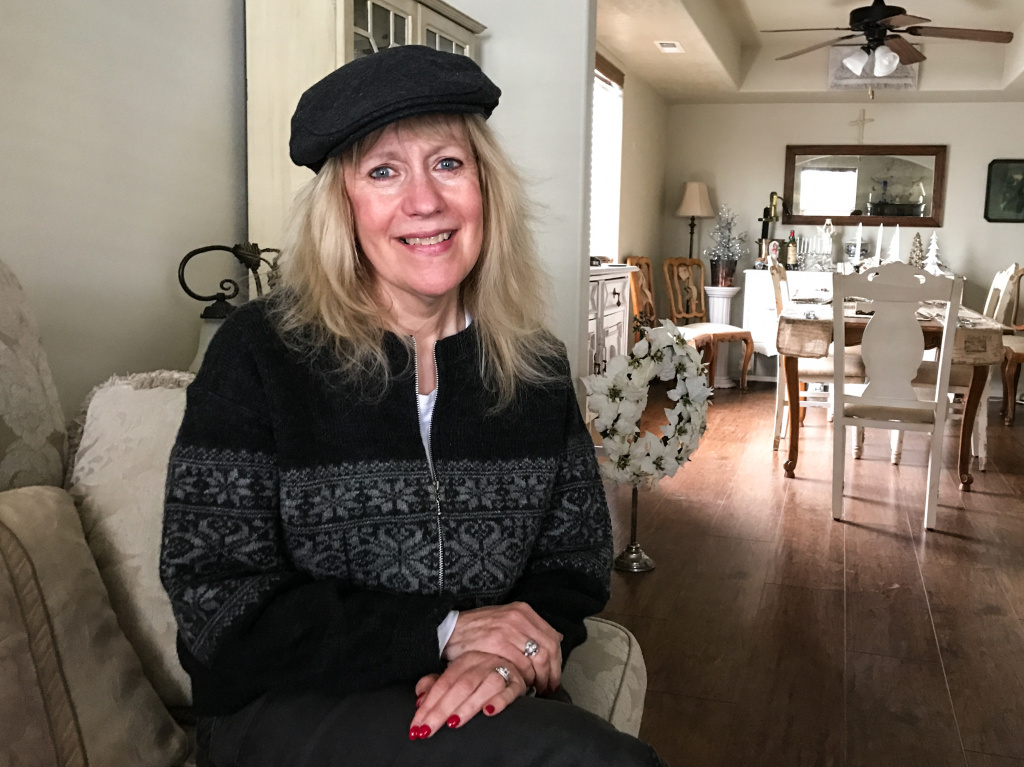 Adrien Koch, 62, sits in the bedroom of her northern Idaho home, which is twice as big and half as expensive as the one she sold in California. Adrien Koch, 62, sits in the bedroom of her northern Idaho home, which is twice as big and half as expensive as the one she sold in California.