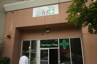 A man enters Private Organic Therapy (P.O.T.), a non-profit co-operative medical marijuana dispensary, on October 19, 2009 in Los Angeles, California. Attorney General Eric Holder announced new guidelines today for federal prosecutors in states where the use of marijuana for medicinal purposes is allowed under state law.