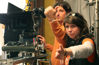Scientist turned director Valerie Weiss discusses a scene with cinematographer Jamie Urman on the set of her film, "Losing Control."