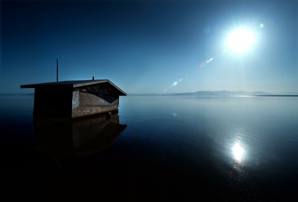 Restoration Plans Being Made to Save Salton Sea A building appears to float away on the Salton Sea near the old Niland boat launch, July 28, 2000, as the water level rises. The state's largest and saltiest lake, land locked in the Colorado Desert of southern California, was formed by accident during a Colorado River water diversion project nearly 100 years ago and is still rising. Amid debate over whether the sea is facing ecological collapse, plans are being drafted to save the formerly important recreational area.