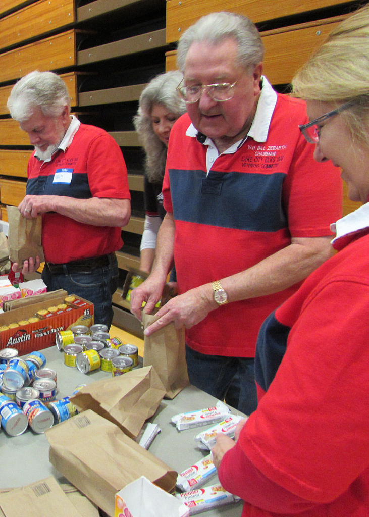 Bill Ziebarth (3rd from left) and other members of the Lake City Elks in Shoreline, Washington pack bags for homeless veterans at the Seattle Stand Down. Bill Ziebarth (3rd from left) and other members of the Lake City Elks in Shoreline, Washington pack bags for homeless veterans at the Seattle Stand Down.