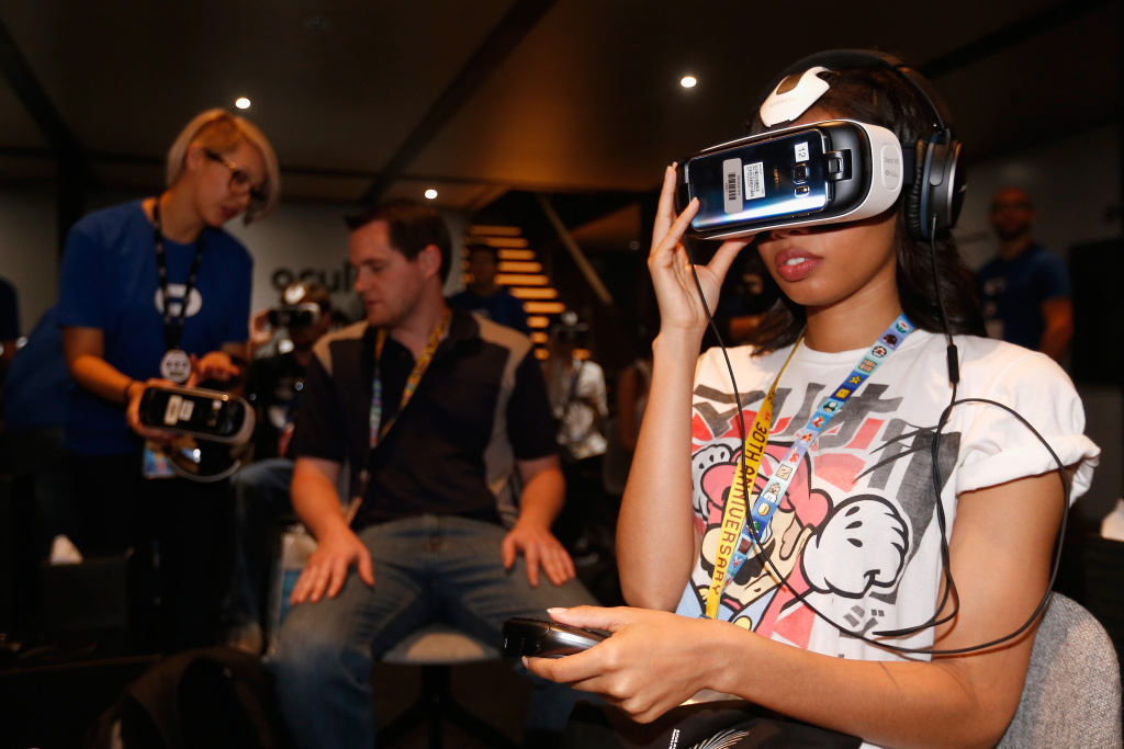 Annual Gaming Industry Conference E3 Takes Place In Los Angeles File: Game enthusiasts test the Samsung Gear VR powered by Oculus at the annual gaming industry conference E3 at the Los Angeles Convention Center on June 16, 2015.