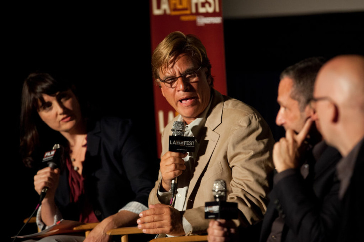 Aaron Sorkin talks with Alan Poul and Greg Mottola at the Los Angeles Film Festival on Friday. The panel was moderated by Madeleine Brand.