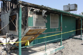 Building damaged Aug. 8, 2009 during prisoner riot at the California Institution for Men in Chino, Calif.