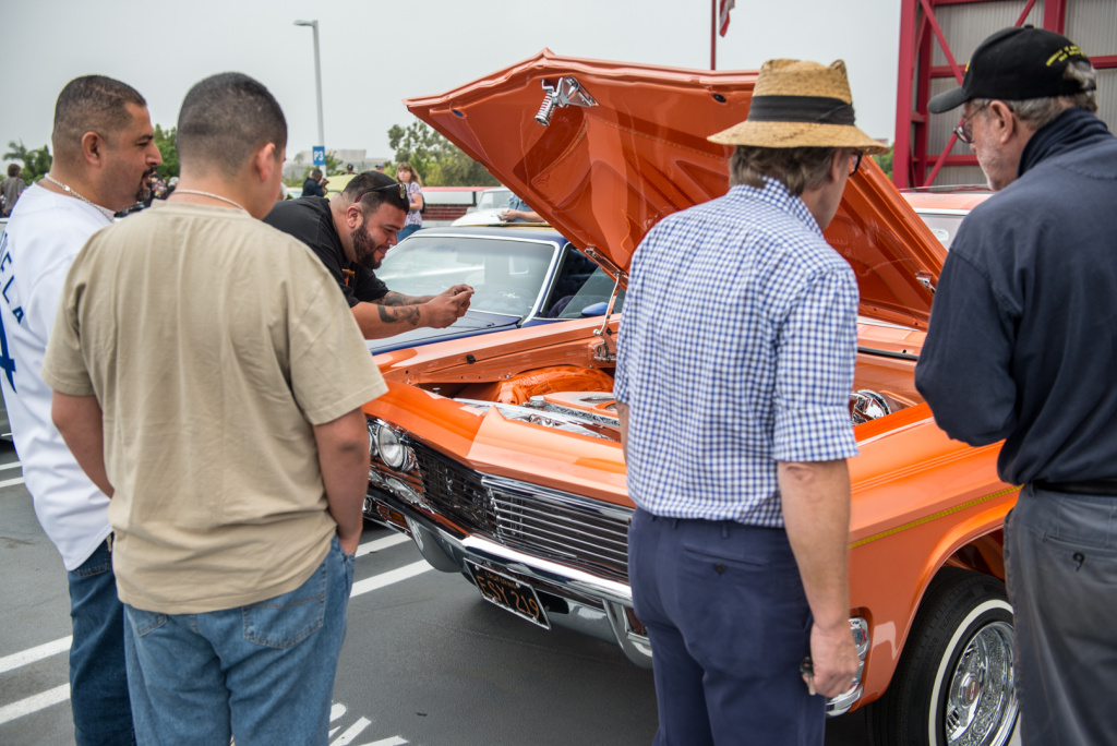 Admirers check out Jesse Saldana's 1965 Chevrolet Impala Super Sport, which won best in show at the Petersen's lowrider gathering. Admirers check out Jesse Saldana's 1965 Chevrolet Impala Super Sport, which won best in show at the Petersen's lowrider gathering.