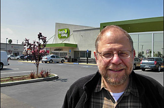 Mercer 7834 Business commentator Mark Lacter standing in the nearly empty parking lot at the Fresh 'n' Easy store in The Comptons.