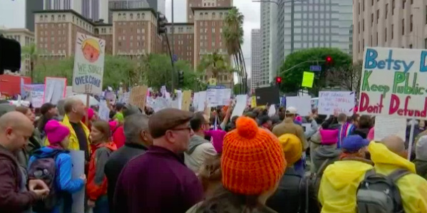 Thousands of people marched in Los Angeles to protest President Trump's immigration policy on Saturday, Feb. 18, 2017.