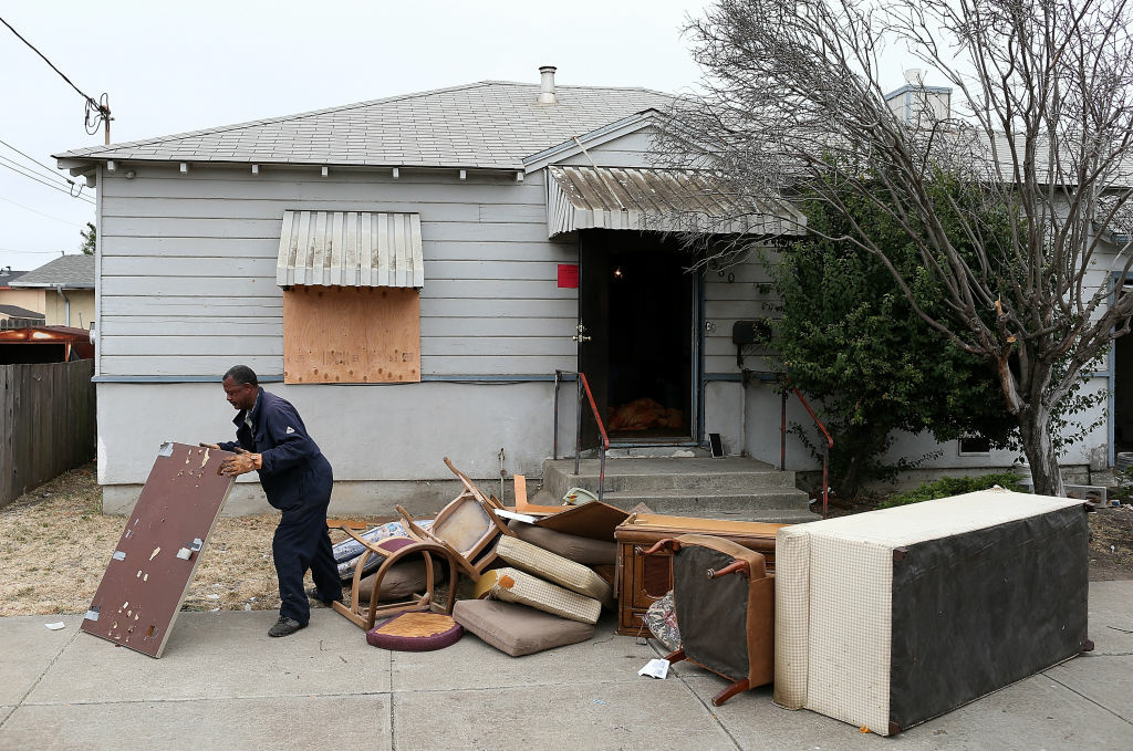 Richmond, CA Hit Hard By Foreclosures A worker removes furniture from a foreclosed home before the start of a bus tour of foreclosed and blighted properties on July 13, 2012 in Richmond, California. Members of the group Alliance of Californians for Community Empowerment (ACCE) joined city officials and Richmond mayor Gayle McLaughlin on a bus tour to view foreclosed properties in neighborhoods in Richmond that have been hit the hardest by foreclosures. Richmond currently has over 1,000 homes in foreclosure.