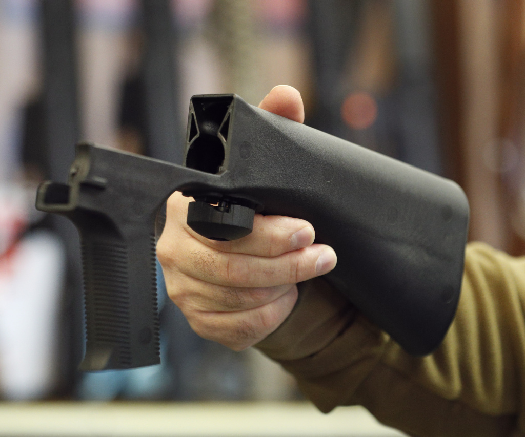 Congress Debates Sale Of Bump Stock Devices After Las Vegas Mass Shooting File: A bump stock device that fits on a semi-automatic rifle to increase the firing speed, making it similar to a fully automatic rifle, is shown here at a gun store on October 5, 2017 in Salt Lake City, Utah.