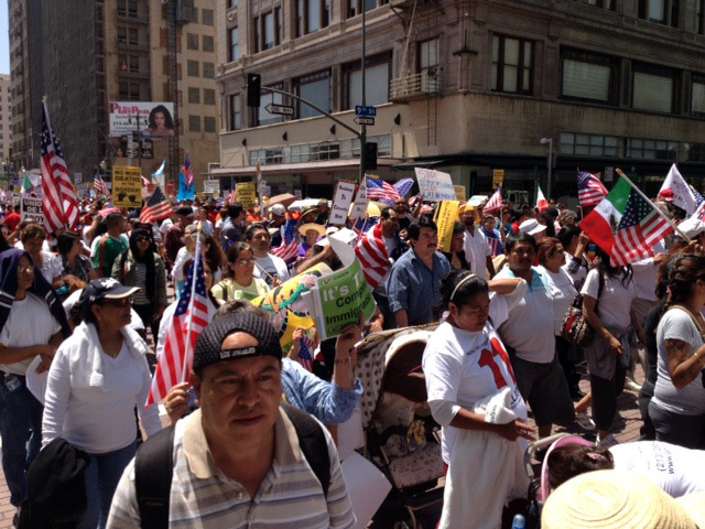 Immigration protesters take to the streets of Los Angeles for a May Day rally march, May 1, 2013. Immigration protesters take to the streets of Los Angeles for a May Day rally march, May 1, 2013.