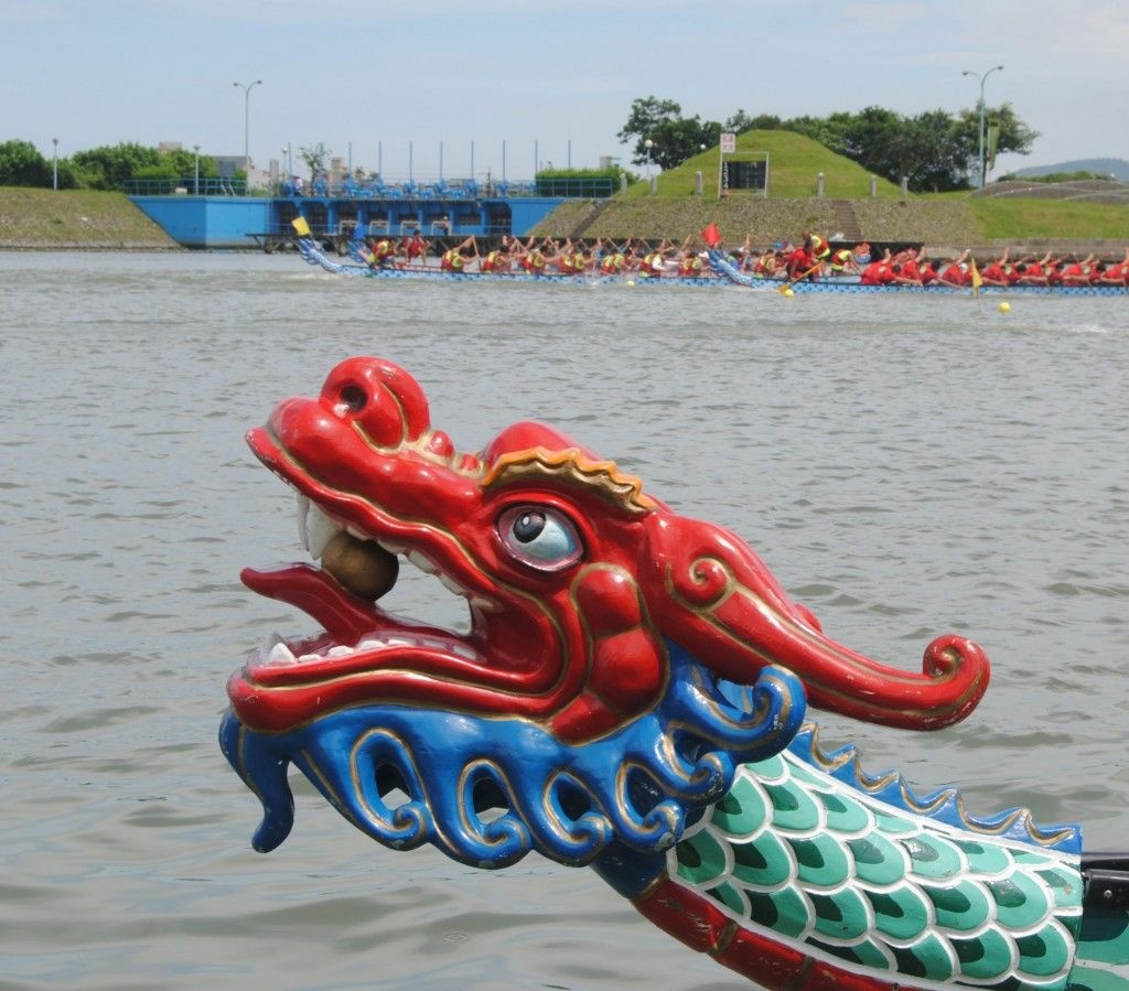 A dragon boat rigged with a Chinese dragon at the head ... a common decoration A dragon boat rigged with a Chinese dragon at the head ... a common decoration