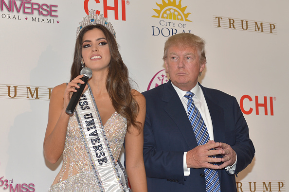 462232778-miss-universe-paulina-vega-and-donald-trump-gettyimages.jpg?v=1&c=IWSAsset&k=2&d=GkZZ8bf5zL1ZiijUmxa7QWsymexagWdvknuV8WQEiC68347yft7GF0p8zsMScUH2 DORAL, FL - JANUARY 25: Miss Universe Paulina Vega and Donald Trump attend The 63rd Annual Miss Universe Pageant winner press conference at Trump National Doral on January 25, 2015 in Doral, Florida. (Photo by Rodrigo Varela/Getty Images)