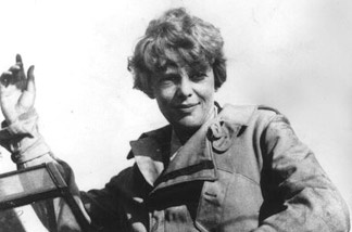 Mercer 12981 Amelia Earhart waves from the cockpit of her plane circa 1929.