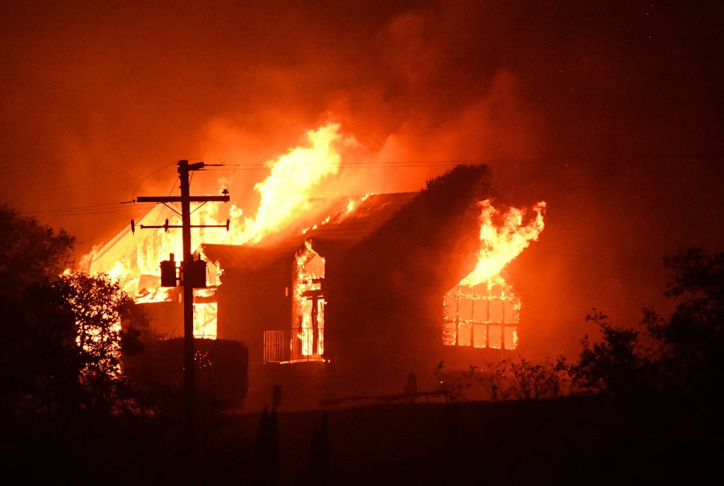 TOPSHOT-US-WILDFIRES-CALIFORNIA The Signorello Estate winery in Napa, California burns on October 9, 2017.
