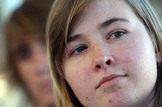 American teenager Abby Sunderland, who was rescued by fishermen from her stricken yacht in the Indian Ocean and transferred to the patrol ship Osiris, poses as she arrives on June 26, 2010 at Saint-Denis de la Reunion on the French island of Reunion.