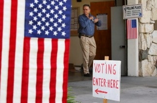 Mercer 11147 A voter walks from the polling place inside Fire Station 38 in Pasadena, California.