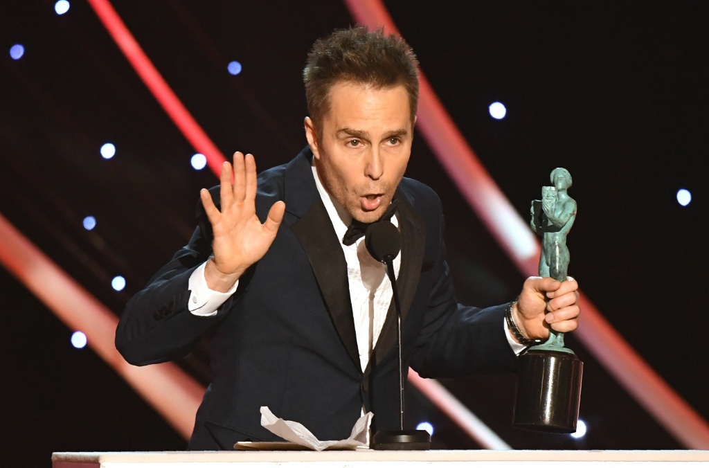 US-ENTERTAINMENT-SAG-FILM-AWARDS-SHOW Sam Rockwell accepts the Outstanding Performance by a Male Actor in a Supporting Role award for 'Three Billboards Outside Ebbing, Missouri' onstage during the 24th Annual Screen Actors Guild Awards show at The Shrine Auditorium on January 21, 2018 in Los Angeles, California.