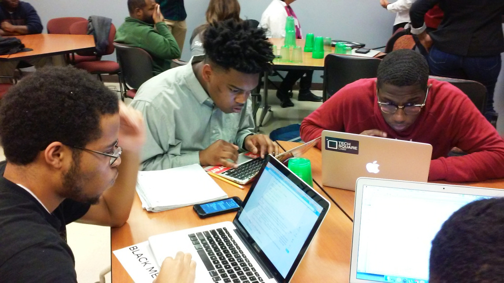 Morehouse College freshmen Philip Rucker, Damon Redding and Tyree Stevenson use a programming language called Python to plot a map of weather stations in the United States. Morehouse College freshmen Philip Rucker, Damon Redding and Tyree Stevenson use a programming language called Python to plot a map of weather stations in the United States.