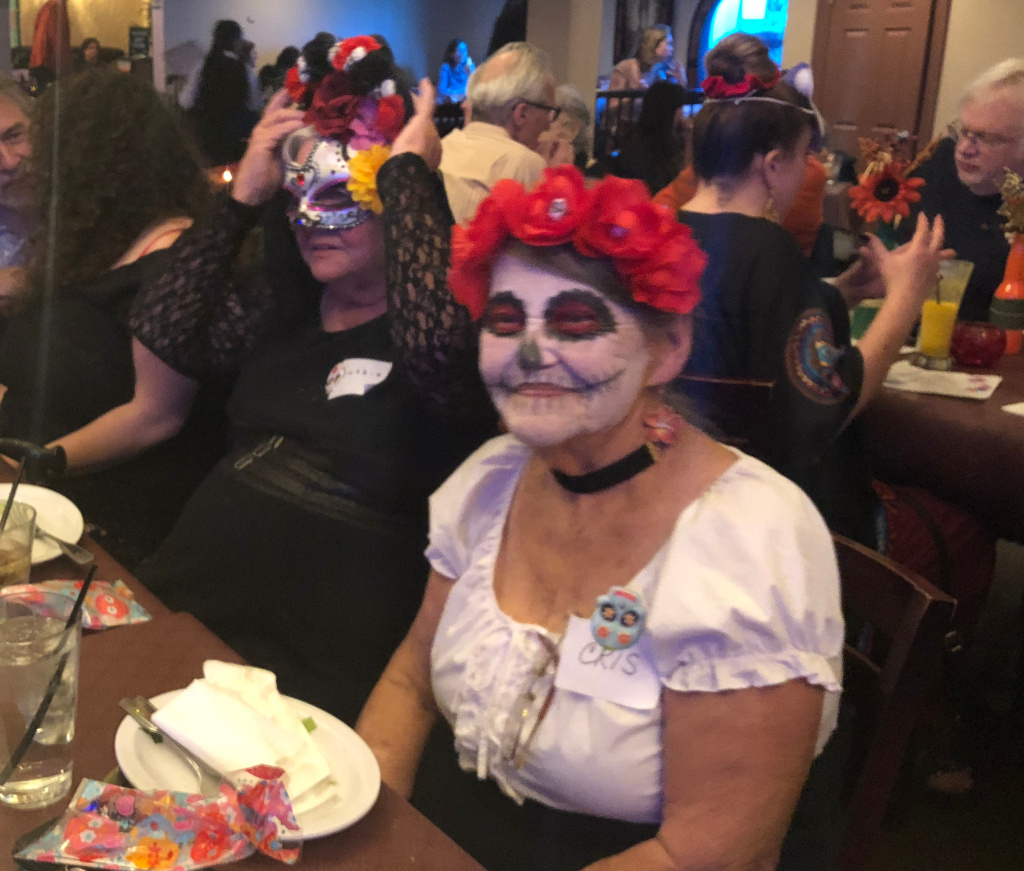Mask Participants at L.A.'s first “Secular Day of the Dead” celebrate in Koreatown on Nov. 1, 2018.
