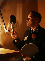 Mercer 8105 NYFD Lt. John Feehan prepares to do an interview about his father, Chief Bill Feehan, a firefighter who was killed on September 11, 2001. You can share your story - whether it's heroic or funny or simple - or interview someone this month with StoryCorps' help.