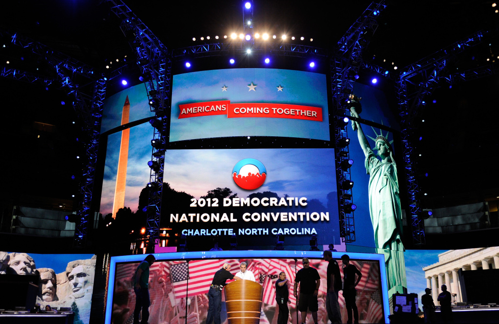 Charlotte Prepares For Democratic National Convention Workers stand on stage during preparations for the Democratic National Convention at Time Warner Cable Arena on September 2, 2012 in Charlotte, North Carolina. The DNC that will start on September 4 and run through September 7, will nominate U.S. President Barack Obama as the Democratic presidential candidate.
