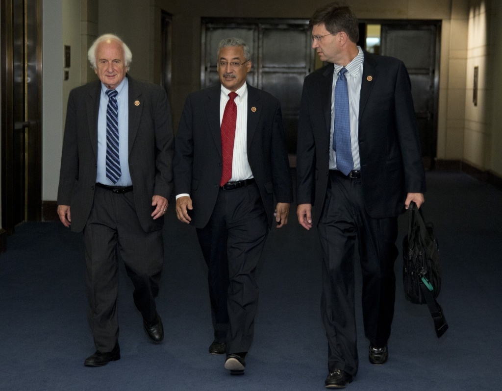 From left, Rep. Sander Levin, D-Mich., Rep. Robert Scott, D-Va., and Rep. Brad Schneider, D- ll., walk to a closed members-only briefing on Syria on Sunday.