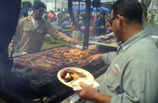 "Save Vernon Jobs" coalition organizers say about 1,000 people attended a barbecue lunch and rally on Thursday to oppose a state assembly bill to dissolve the city.