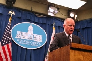 California Governor Jerry Brown pauses as he speaks to reporters as he announces his proposed budget at the California State Capitol on January 10, 2011 in Sacramento, California.